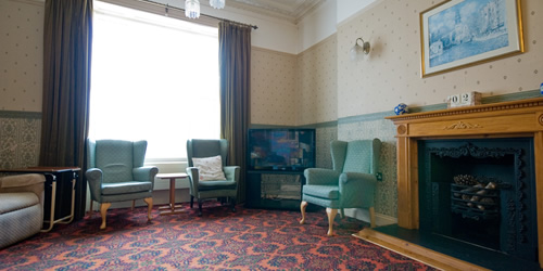 One of two large living rooms at Waungron Care Home